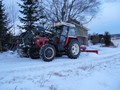 HÃ¥kon getting the snow away