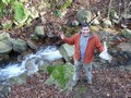 A PhD student from Chili at a creek (Riera Major) in Montseny park